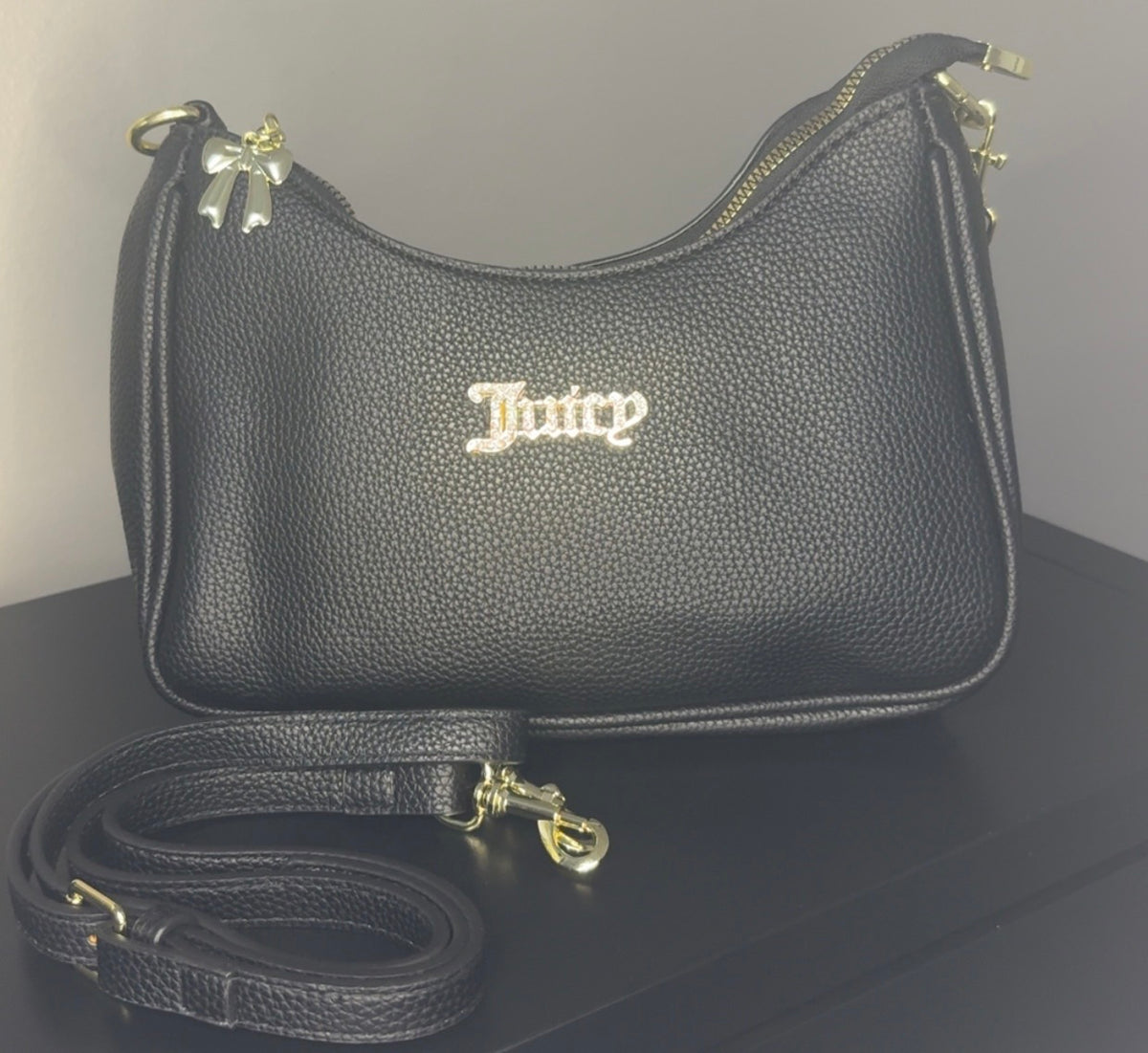 Juicy Couture shoulder bags.